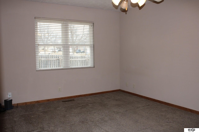 carpeted empty room with ceiling fan