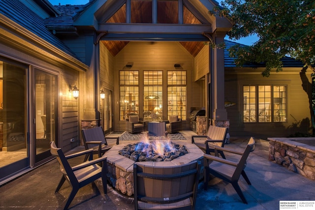 view of patio with an outdoor fire pit