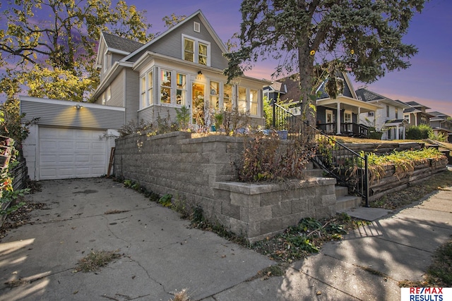 view of front of home with a garage