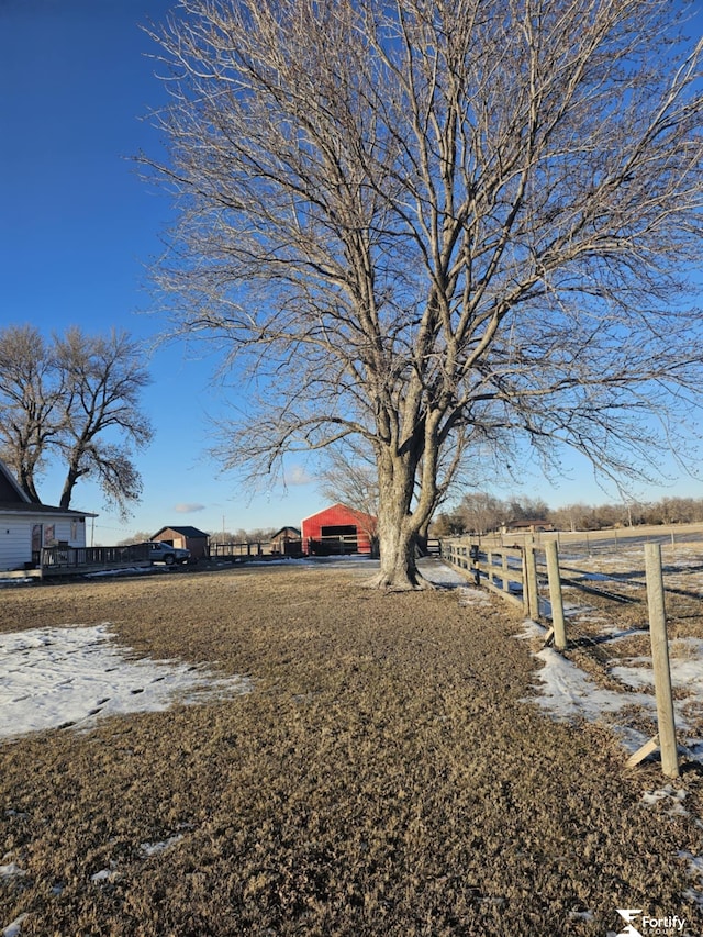 view of yard with a rural view