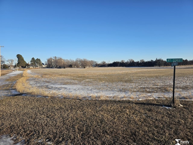 exterior space with a rural view