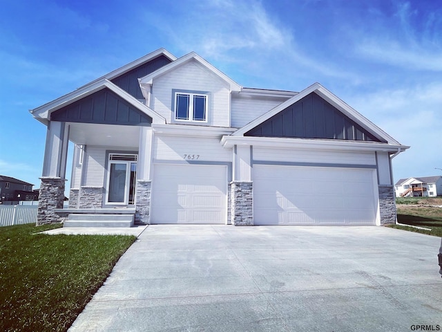 craftsman house with a garage