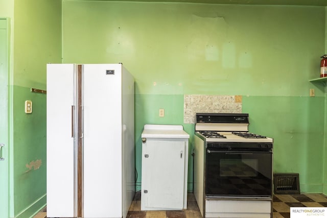 kitchen featuring white appliances