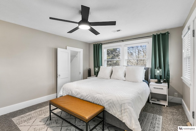 bedroom with ceiling fan and carpet