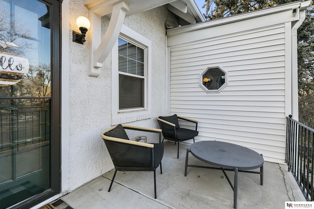 view of patio / terrace featuring a balcony