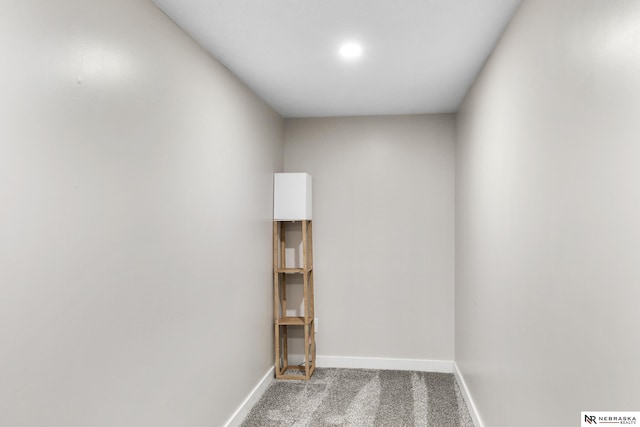 unfurnished room with light carpet