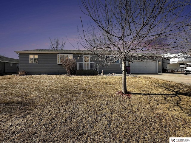 single story home featuring a garage