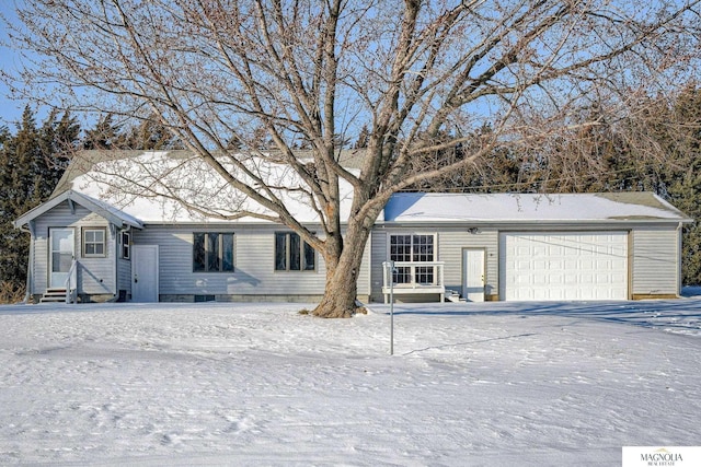 ranch-style home with a garage