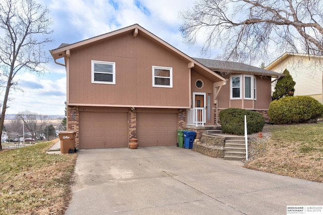 bi-level home featuring a garage