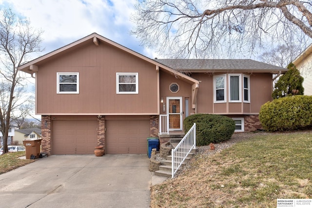 bi-level home featuring a garage