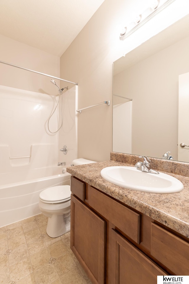 full bathroom with vanity, toilet, and bathtub / shower combination