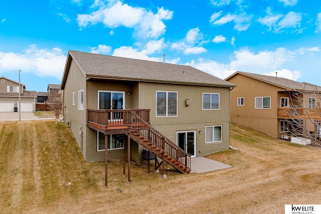 back of house featuring a deck