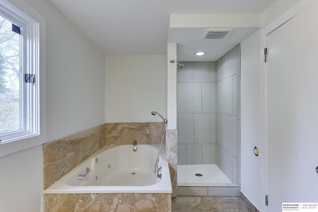 bathroom featuring separate shower and tub and a wealth of natural light