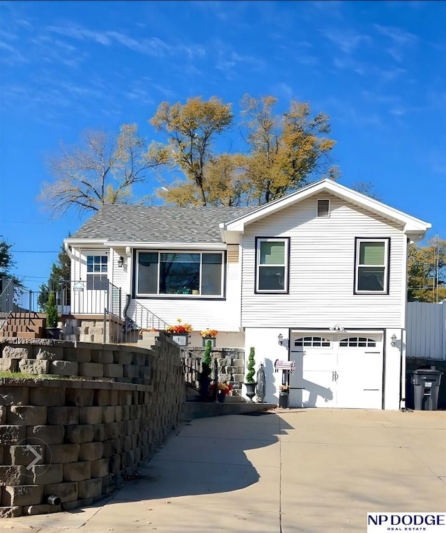 view of front of home with a garage