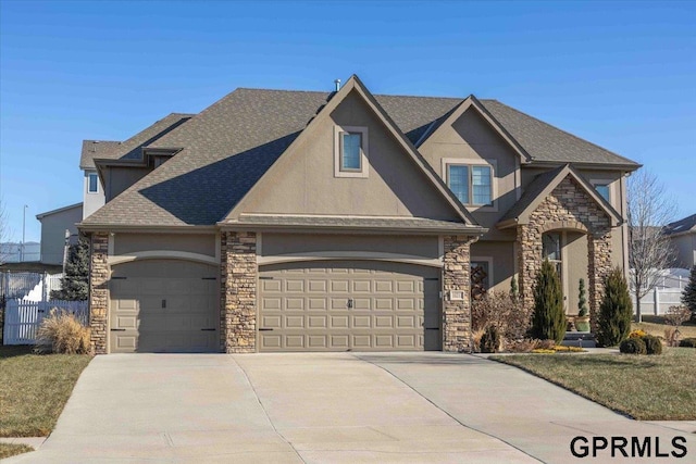 view of front of home with a garage