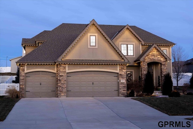 view of front of property featuring a garage