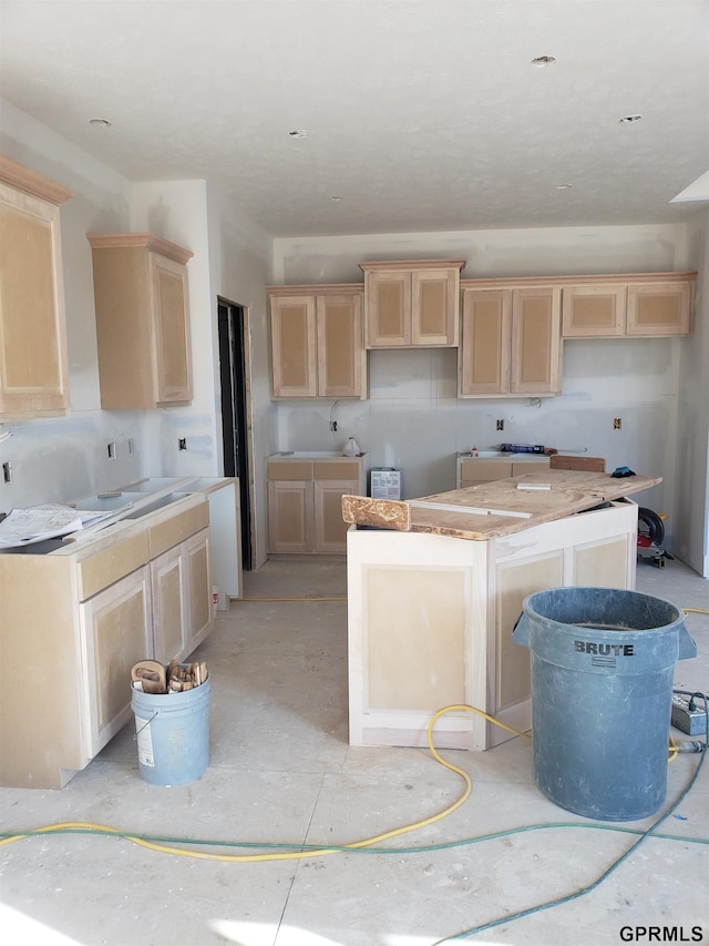 kitchen featuring light brown cabinetry and a kitchen island