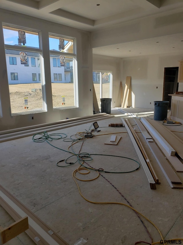 unfurnished room featuring a tray ceiling