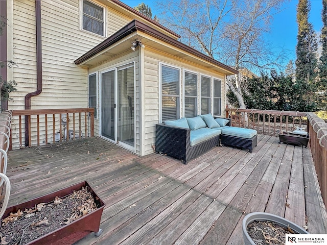 wooden deck with outdoor lounge area