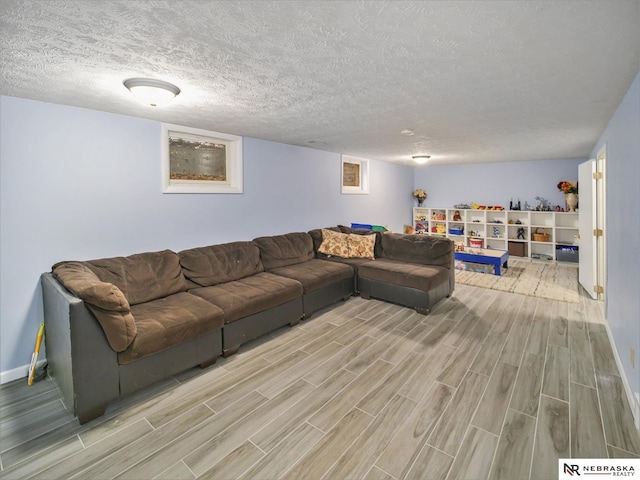 living room featuring a textured ceiling