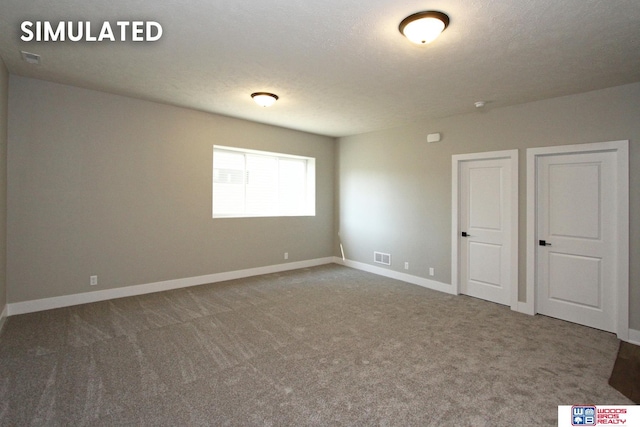 unfurnished bedroom with carpet floors