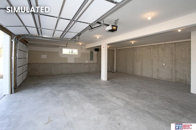 garage featuring electric panel and a garage door opener