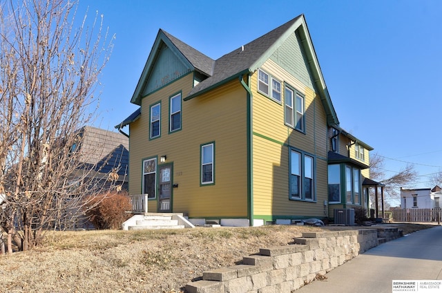 view of front of home featuring central air condition unit