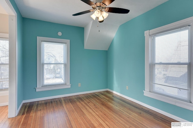 additional living space featuring ceiling fan, plenty of natural light, light hardwood / wood-style flooring, and lofted ceiling