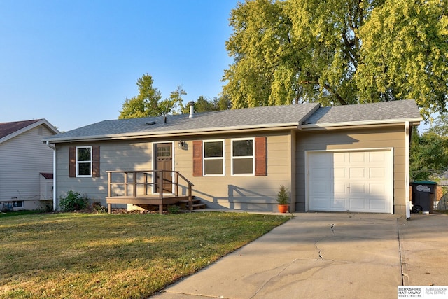 single story home featuring a front yard and a garage