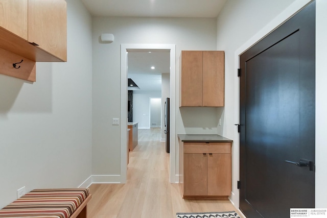 hallway featuring light hardwood / wood-style flooring