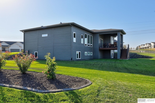 view of side of property with a lawn