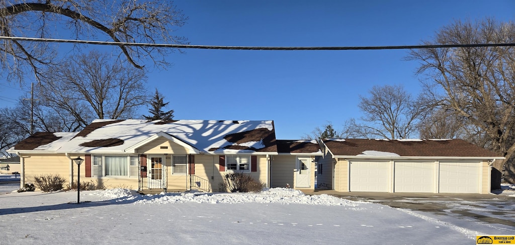 view of front of property featuring a garage