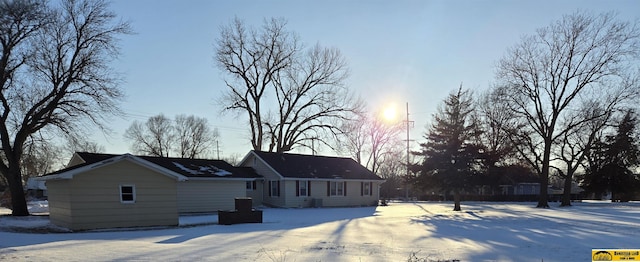 view of snow covered house