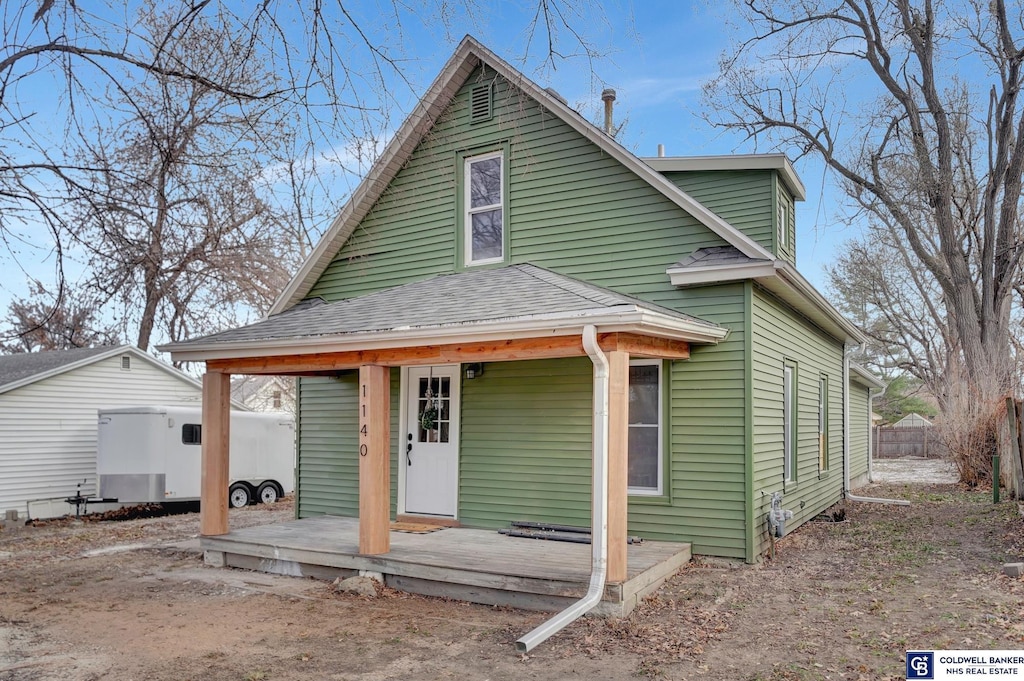 view of front of property with a deck