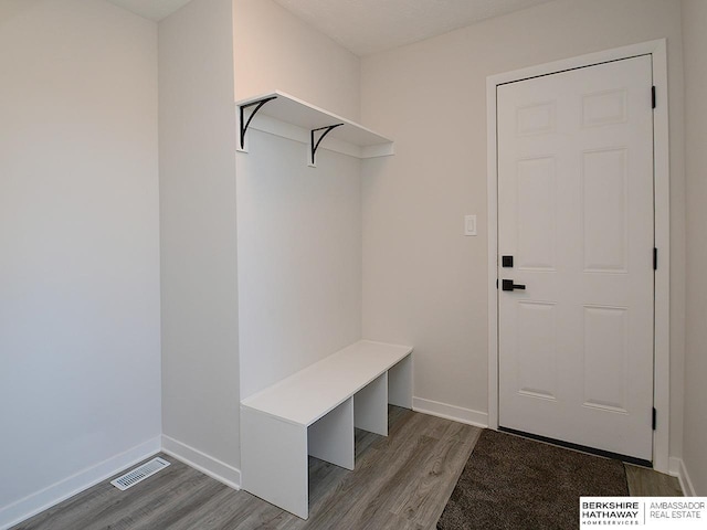 mudroom with hardwood / wood-style floors