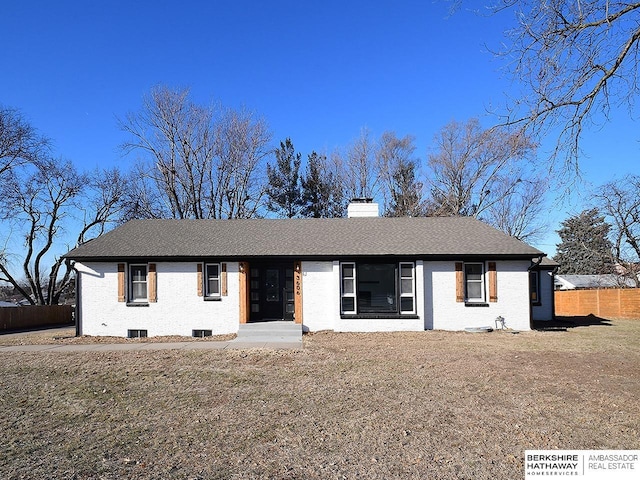 ranch-style house with a front lawn