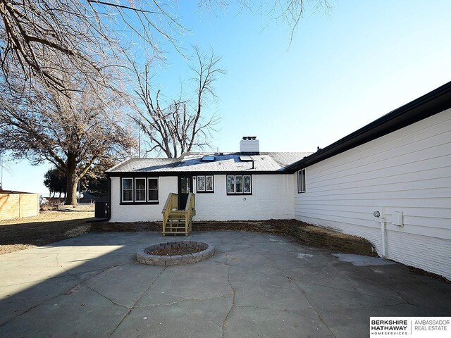 rear view of property with a patio area