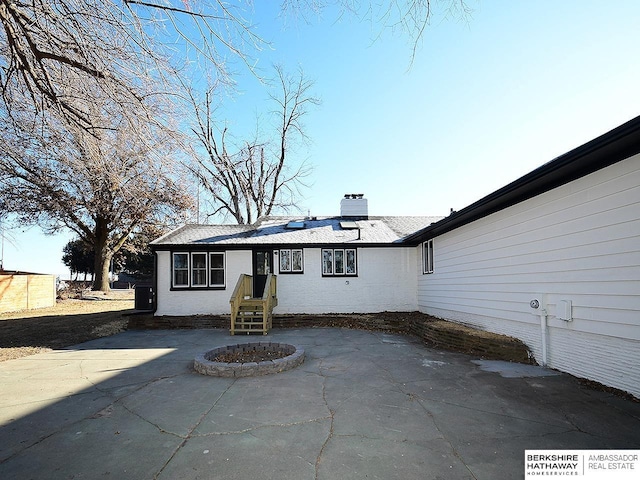 rear view of property with a patio area