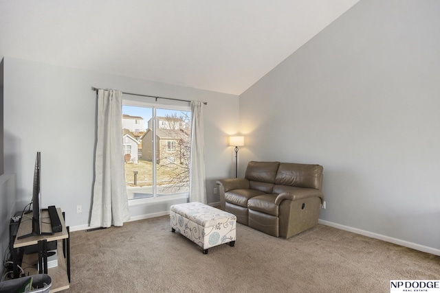 living room with light carpet and vaulted ceiling