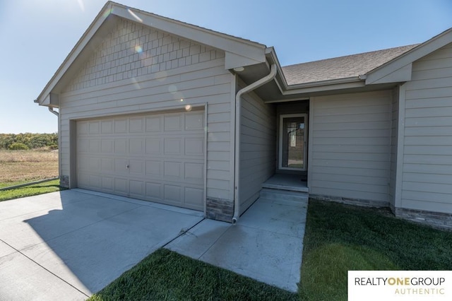 view of front of home with a garage