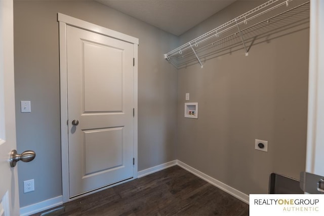 laundry room with electric dryer hookup, hookup for a washing machine, and dark hardwood / wood-style floors