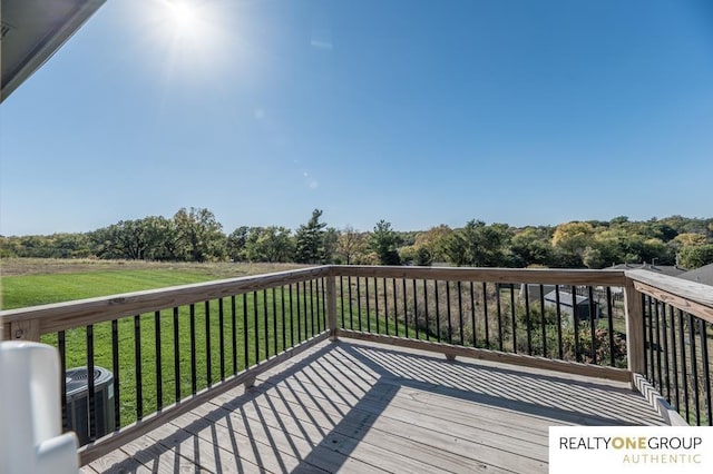 deck with a yard and cooling unit