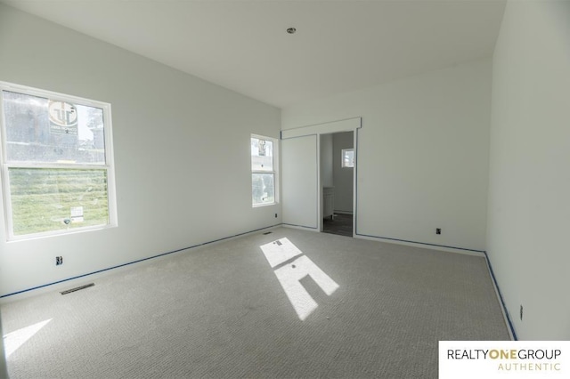 unfurnished bedroom with carpet flooring