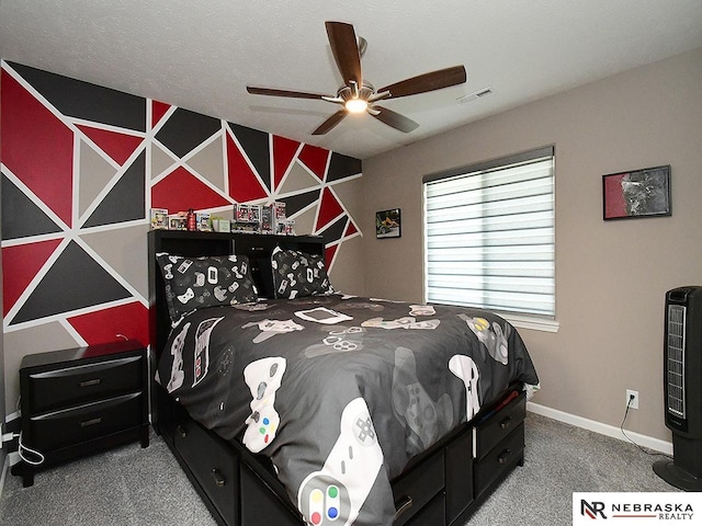 bedroom with ceiling fan and carpet