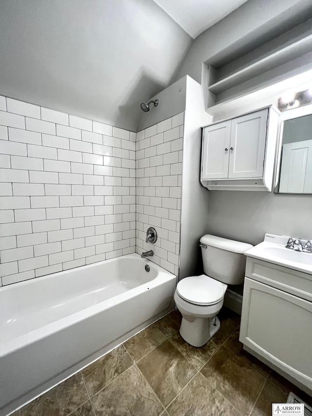 full bathroom featuring vanity, toilet, and tiled shower / bath