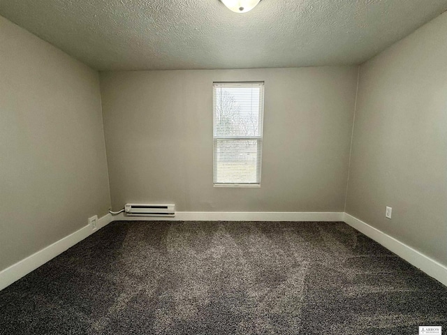 carpeted empty room featuring a textured ceiling and a baseboard radiator