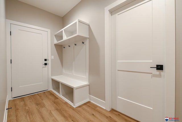 mudroom with light hardwood / wood-style floors