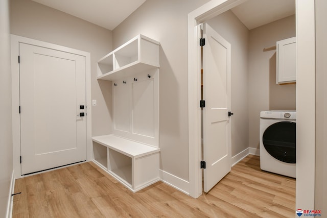 mudroom featuring washer / dryer and light hardwood / wood-style flooring