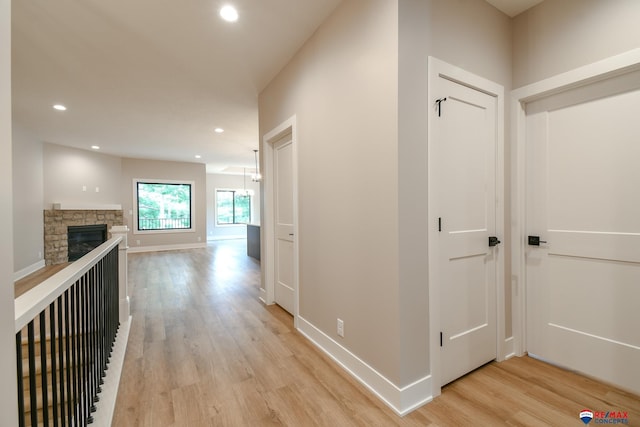 hall with light wood-type flooring