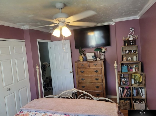 bedroom with a textured ceiling, ceiling fan, and crown molding